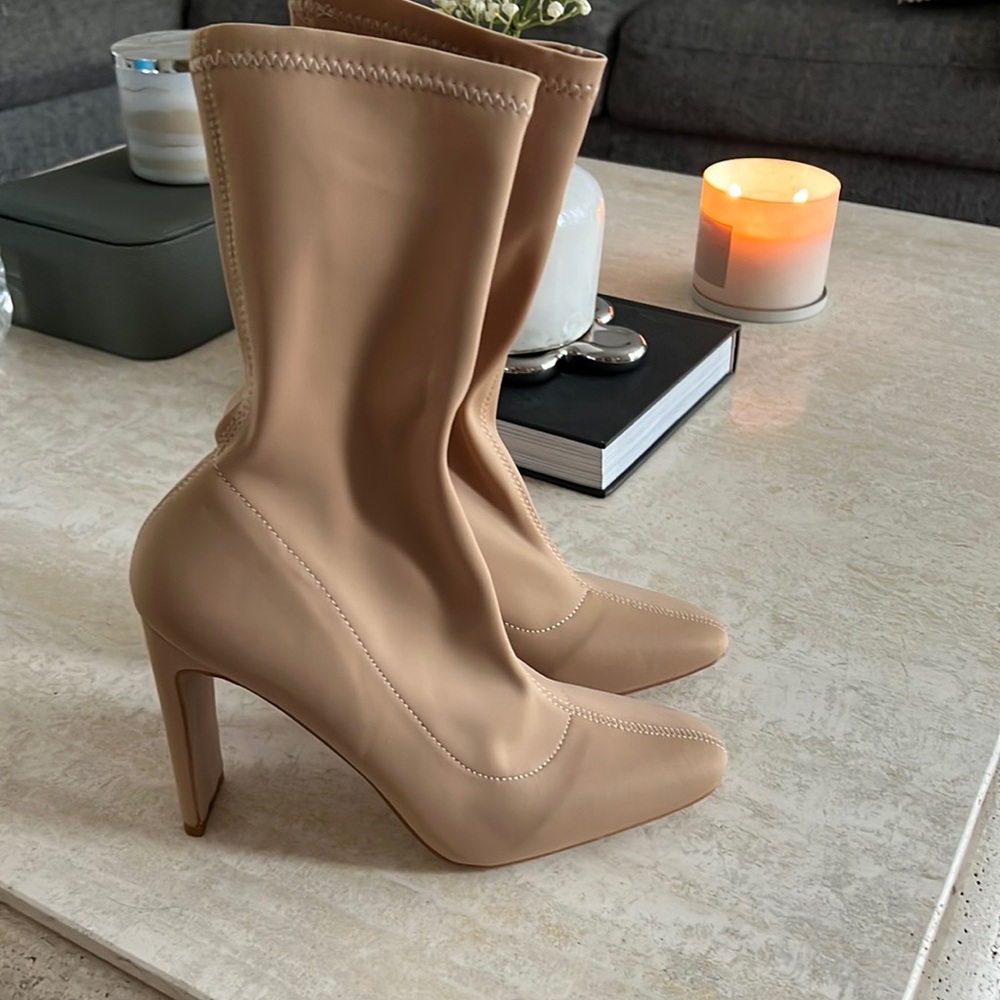 Beige Boot Heels, never been worn. Size 5